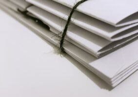 stack of legal papers for wrongful termination lawsuit